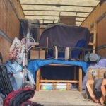 Loading a your belongings with care on our moving trucks